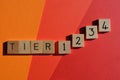 Tier, 1,2,3,4,. words in 3D wooden alphabet letters