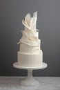 4 Tier Trendy Wedding Cake Decorated With Ruffles And Pulled Sugar Royalty Free Stock Photo