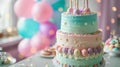 Tiered Birthday Cake with Festive Balloon Decorations