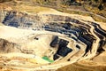 The tiers of an open pit copper mine.