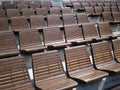 Tiers of wooden chairs in outdoor arena Royalty Free Stock Photo