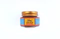 Tiger Balm red ointment in isolated background