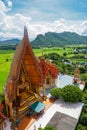 Tiger cave temple, wat tham sua, big buddha image, stupa, pagoda by mountain, Thailand Royalty Free Stock Photo