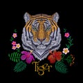 Tiger head tropic flower. Front view embroidery patch sticker. Orange striped black wild animal stitch texture textile print. Jung