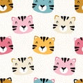 Tiger kitten with polka dots. Seamless pattern with cute animals faces. Childish print for nursery in a Scandinavian style. For Royalty Free Stock Photo