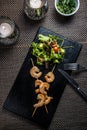 Tiger prawn skewer in sweet honey sauce with lime Royalty Free Stock Photo