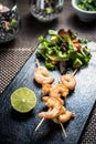 Tiger prawn skewer in sweet honey sauce with lime Royalty Free Stock Photo