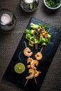 Tiger prawn skewer in sweet honey sauce with lime Royalty Free Stock Photo