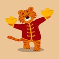 tiger in a red jacket is holding gold bars Royalty Free Stock Photo