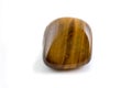 Tiger's eye gemstone close up white background