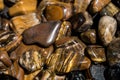 Tiger`s eye and hawk`s eye gemstone as mineral rock