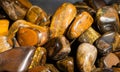 Tiger`s eye and hawk`s eye gemstone as mineral rock