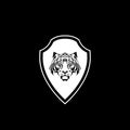 Tiger shield icon isolated on dark background