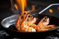 tiger shrimp prawn sizzling in a pan, with its shell on fire