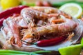 Tiger shrimps with lime, lemon and red pepper