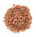 Tigernuts isolated on white background. Chufa nuts or tiger nuts in wooden bowl. Top view