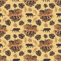 Tigers on a background of tropical leaves. Seamless pattern Royalty Free Stock Photo