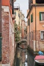 Tight Canal in Venice, Bridges crossing water in Venice Royalty Free Stock Photo