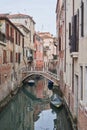 Tight Canal in Venice, Bridges crossing water in Venice Royalty Free Stock Photo