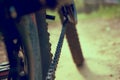 A tight chain of a high-speed bicycle. Active recreation in the open area in the forest and park. Selective selective focus Royalty Free Stock Photo