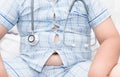 Tight shirt of pajamas with stethoscope Royalty Free Stock Photo