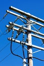 Tight Shot Of Wooden Power Pole Against Blue Sky Royalty Free Stock Photo