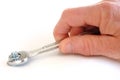 Tightening a Nut Using an Open-End Wrench Royalty Free Stock Photo