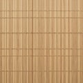 Tightly arranged vertical bamboo slats make up this panel, their light brown color and Royalty Free Stock Photo