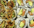 Tightly packed sushi rolls on platter Royalty Free Stock Photo