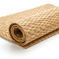 A tightly rolled woven mat featuring a natural, tan-color. The mat\'s texture is defined Royalty Free Stock Photo