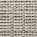 Tightly woven pattern resembling wickerwork, consisting of interlaced strands of light beige Royalty Free Stock Photo