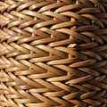 Tightly woven wickerwork pattern, featuring interlaced light brown reeds or strips of Royalty Free Stock Photo