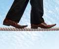 Tightrope walker businessman