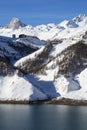 Tignes village in winter with lake