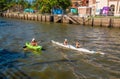 Tigre, Argentina - February 21, 2023: resting people in boats on the river in the city of Tigris