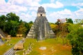 Tikal National Park on Unesco World Heritage. The Grand Plaza with the North Acropolis and Temple I Great Jaguar Temple