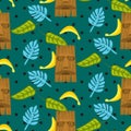 Tiki mask and palm leaves seamless vector pattern. Royalty Free Stock Photo