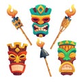 Tiki masks, hawaiian tribal totem and torches Royalty Free Stock Photo