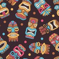 Tiki masks pattern. authentic exotic tribal masks seamless background Royalty Free Stock Photo