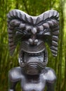 Tiki statue in topical jungle