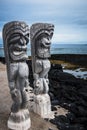 Tiki statues in Pu\'uhonua o honaunau park Royalty Free Stock Photo