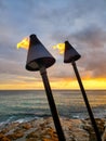 Tiki torches on Hawaiian coast Royalty Free Stock Photo