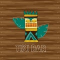 Tiki tribal wooden mask, signboard of bar. Hawaiian traditional elements
