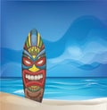 Tiki warrior mask design surfboard on ocean beach