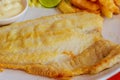 Tilapia fish steak on a white plate. Royalty Free Stock Photo