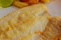 Tilapia fish steak on a white plate. Royalty Free Stock Photo