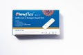 Tilburg, Netherlands - 05.18.2021: Flowflex speed corona test in a box on light background. Sars-Cov-2 antigen rapid test - illust