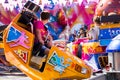 Tilburg, Netherlands - 2207.2019: people having a ride on break dance carousel in luna park, funfair called Kermis in Tilburg Royalty Free Stock Photo