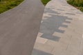 Tile and asphalt combination in the yard Royalty Free Stock Photo