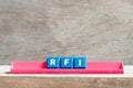 Tile letter on rack in word RFI Abbreviation of request for information on wood background